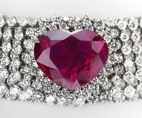 Heart shaped ruby set amongst diamonds
