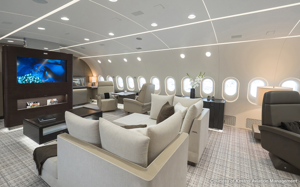 Living room with television Boeing Business Jets BBJ MAX A Look Inside Luxury Planes
