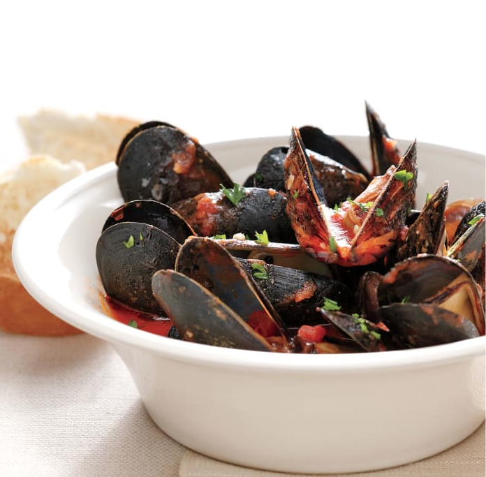 mussels in spicy broth. Italian Christmas Dinner: Traditional Foods to Try This Year
